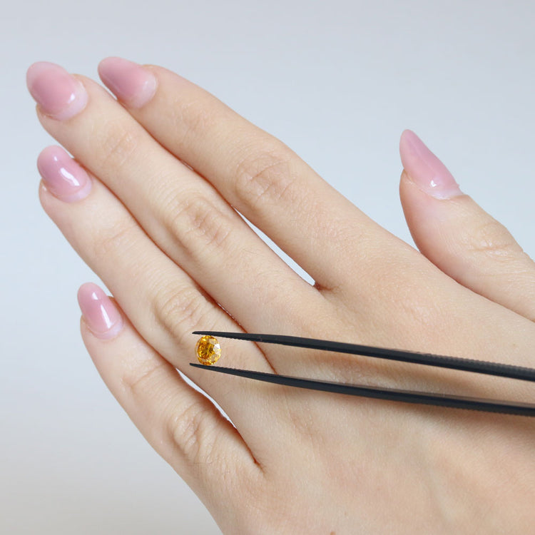 0.69 ct Fancy Vivid Orange Diamond