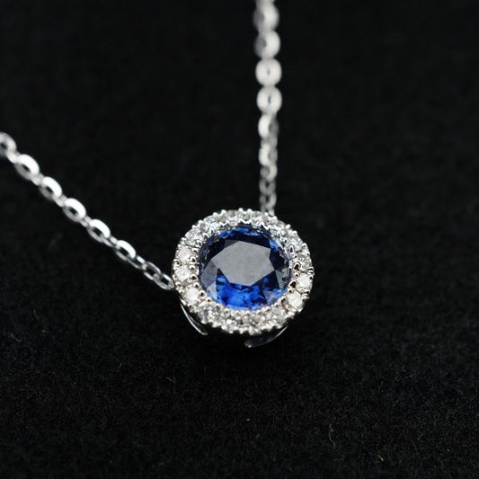 Dije de zafiro con halo de diamantes
