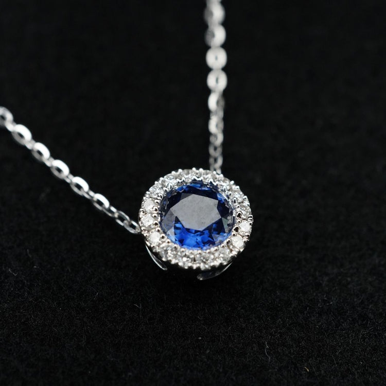 Dije de zafiro con halo de diamantes