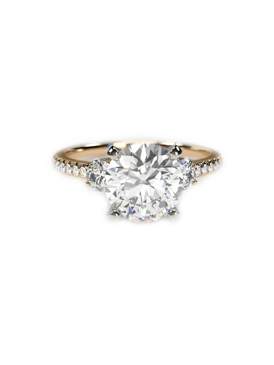 3-stone engagement ring with set diamonds 0.10 ct total
