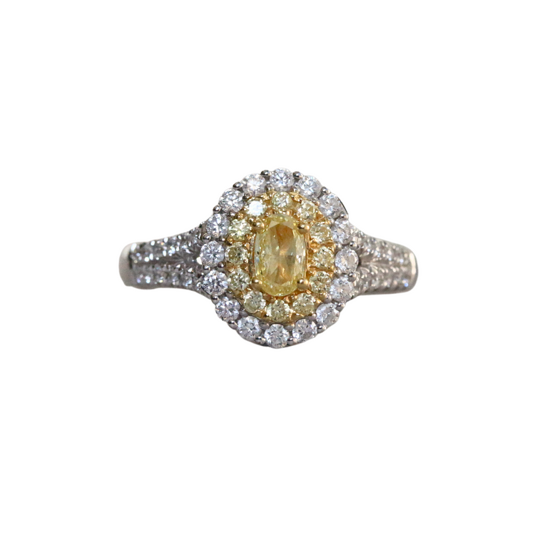 Anillo de diamante Fancy Yellow con halo y pavé de diamantes en oro blanco 18K