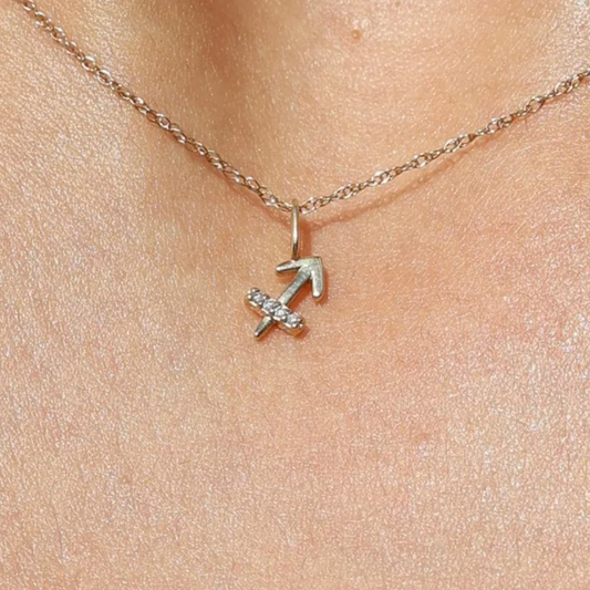 Dije signo sagitario con diamantes